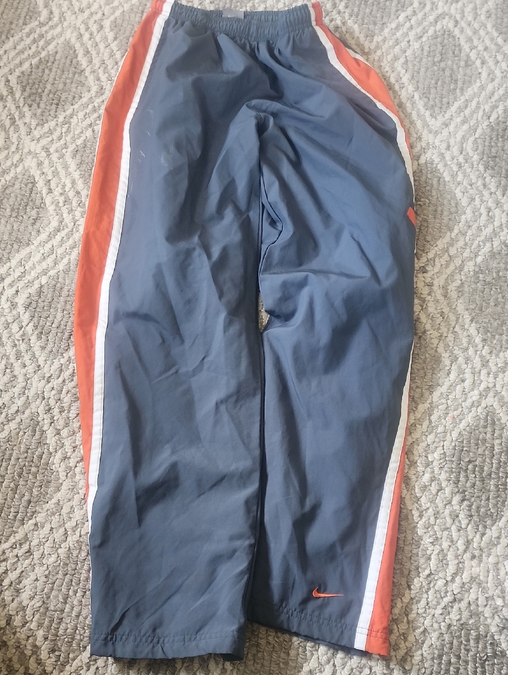 Nike Navy Track Pants with Orange & White Side Stripes